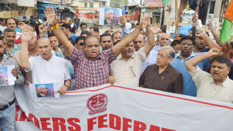 Jammu: Traders demands withdrawal of 5% GST on food grains, lodges strong protest at Ware House